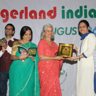 Mrs Aarti Kumar receives the award on behalf of her daughter Shaan