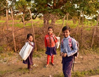 CHILDREN OF ONE OF THE PERIPHERY VILLAGES RETURNING HOME AFTER SCHOOL